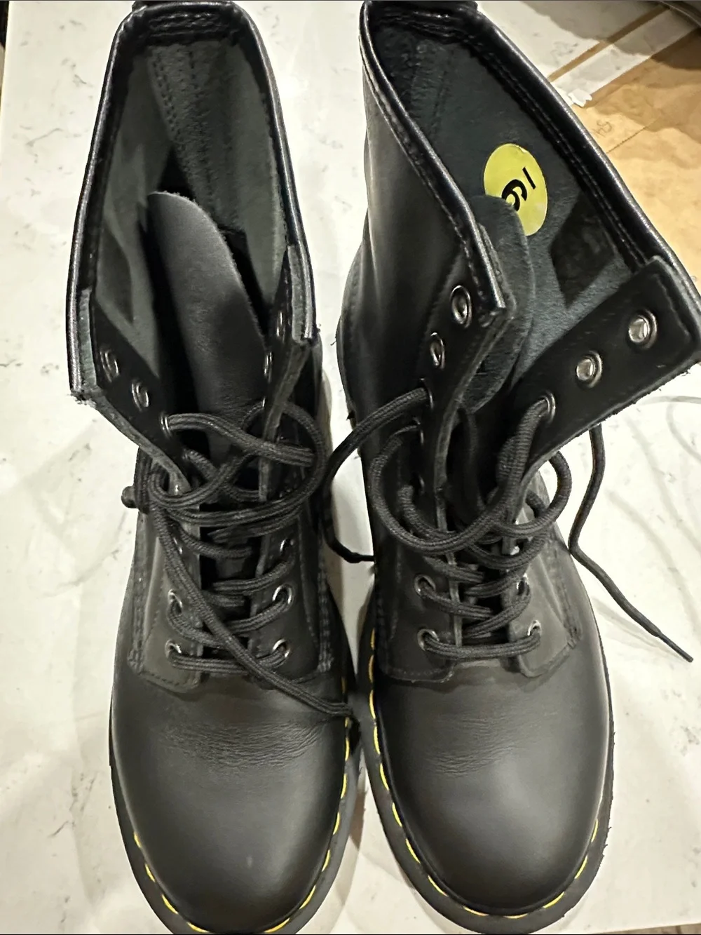 Dr. Martens Black Leather Lace-Up Boots with Yellow Welt Stitching
